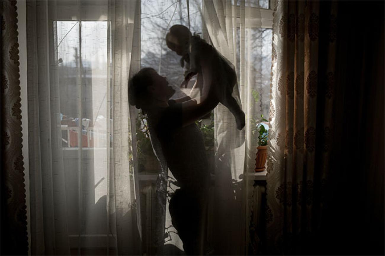 Mother and child at home in Kyrgyzstan